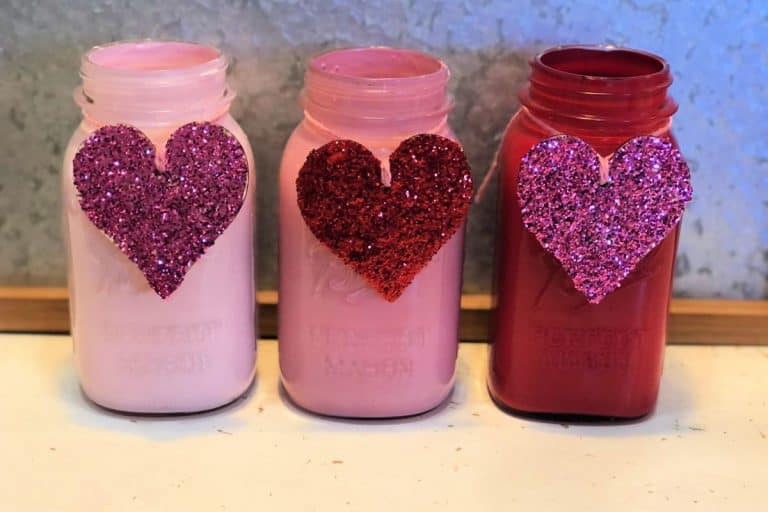 Valentine's Day Mason Jars with glitter hearts tied with pink twine