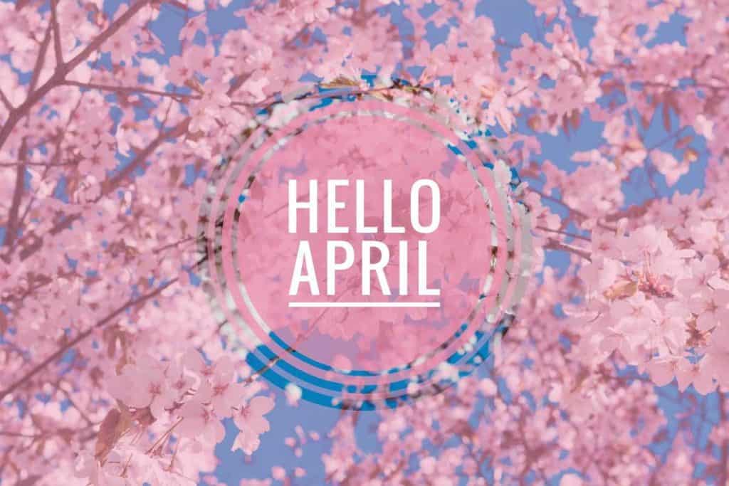 A Hello April graphic with a background of cherry blossom trees